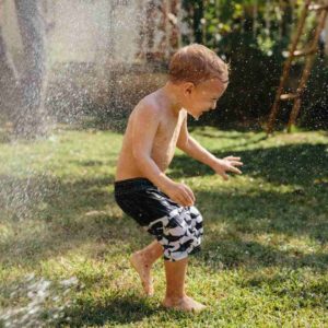 Boy playing with water